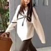 Autumn and winter new versatile design bow knitted sweater women's loose soft waxy round neck pullover