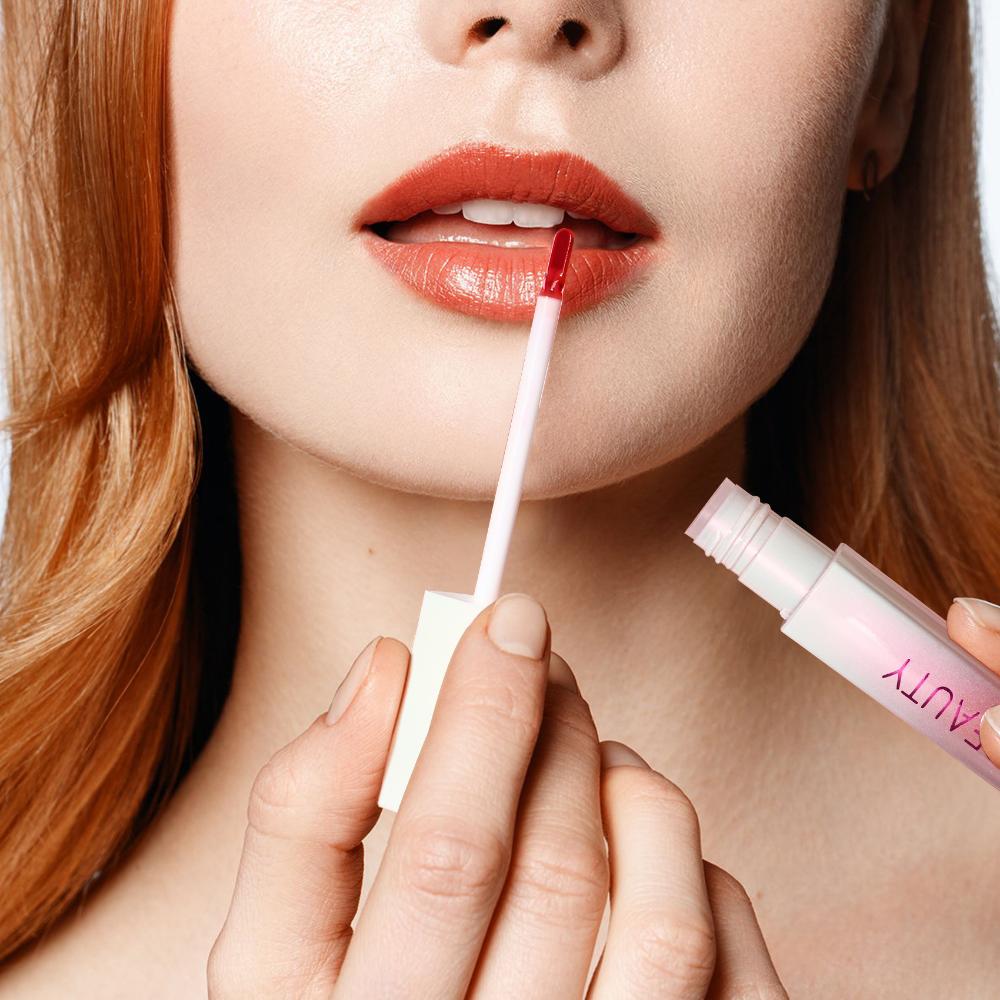 DNM Plumping Warm Lip Glaze Hydratační a průsvitná rtěnka měnící barvu rtů Glaze