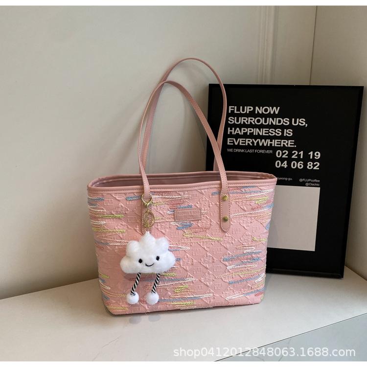 

Корейская версия милой сумки-тоут в стиле инс для студенческих занятий 2025 новая модная тканевая сумка для поездок большой вместимости на одно плечо для женщин розовый