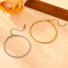 European & American Stainless Steel Gold-Tone Twisted Bracelet - Fashionable, Durable, Colorfast Titanium Steel Design.