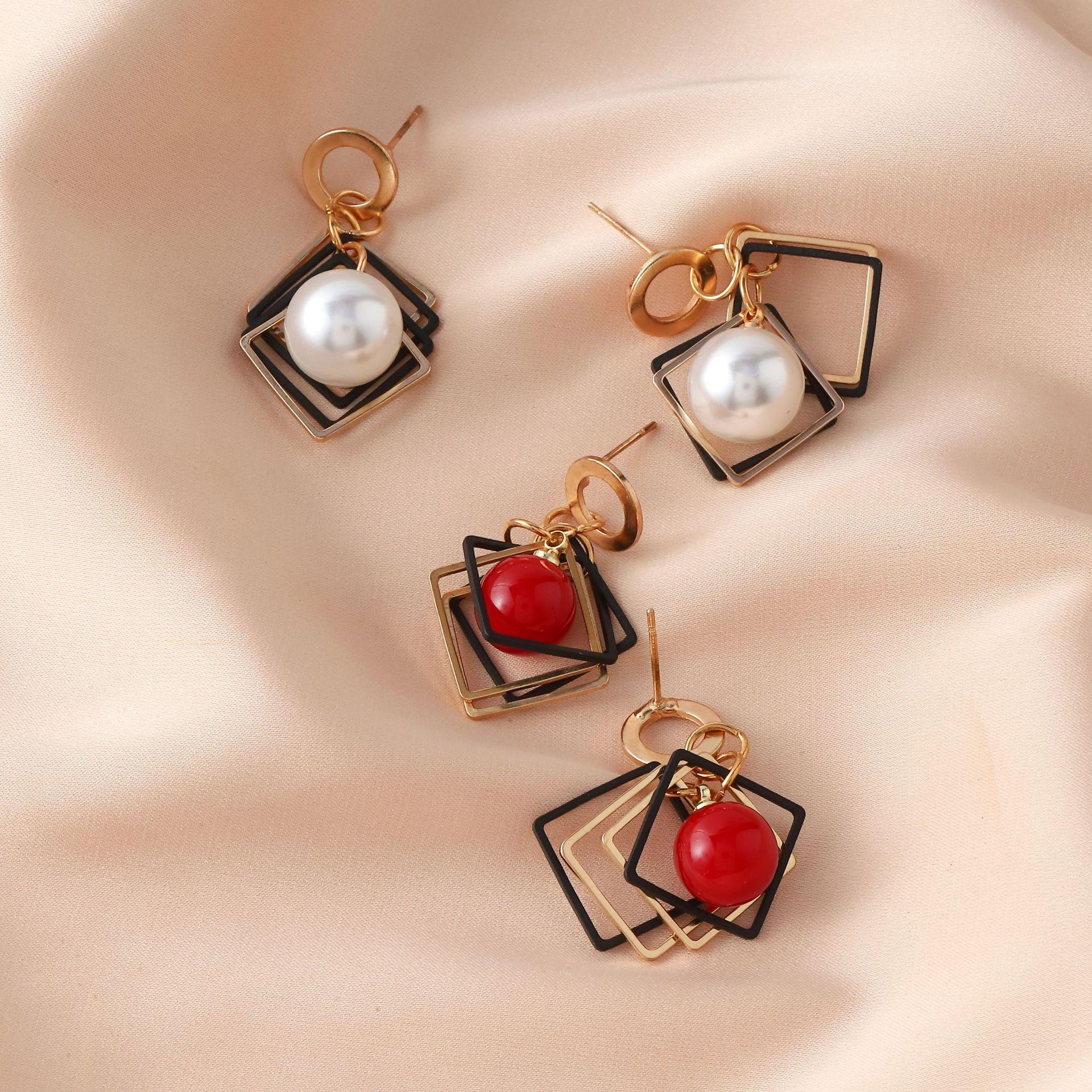 

Pearl earrings retro temperament earrings design sense earrings silver needle French red versatile красный