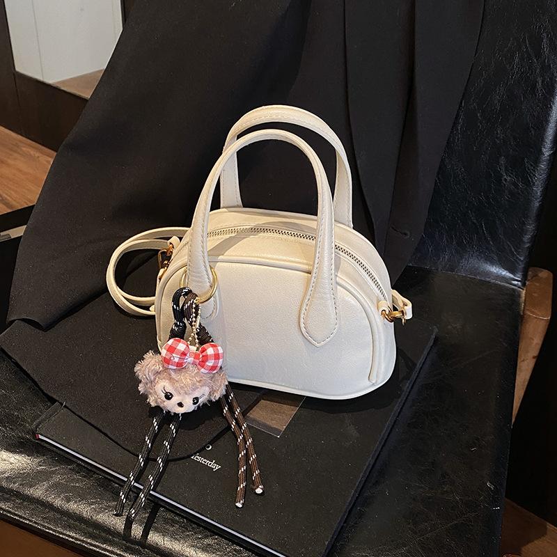 Mode handburen kuddeväska dam 2025 ny avslappnad mjuk läder axel skalväska trendig budväska