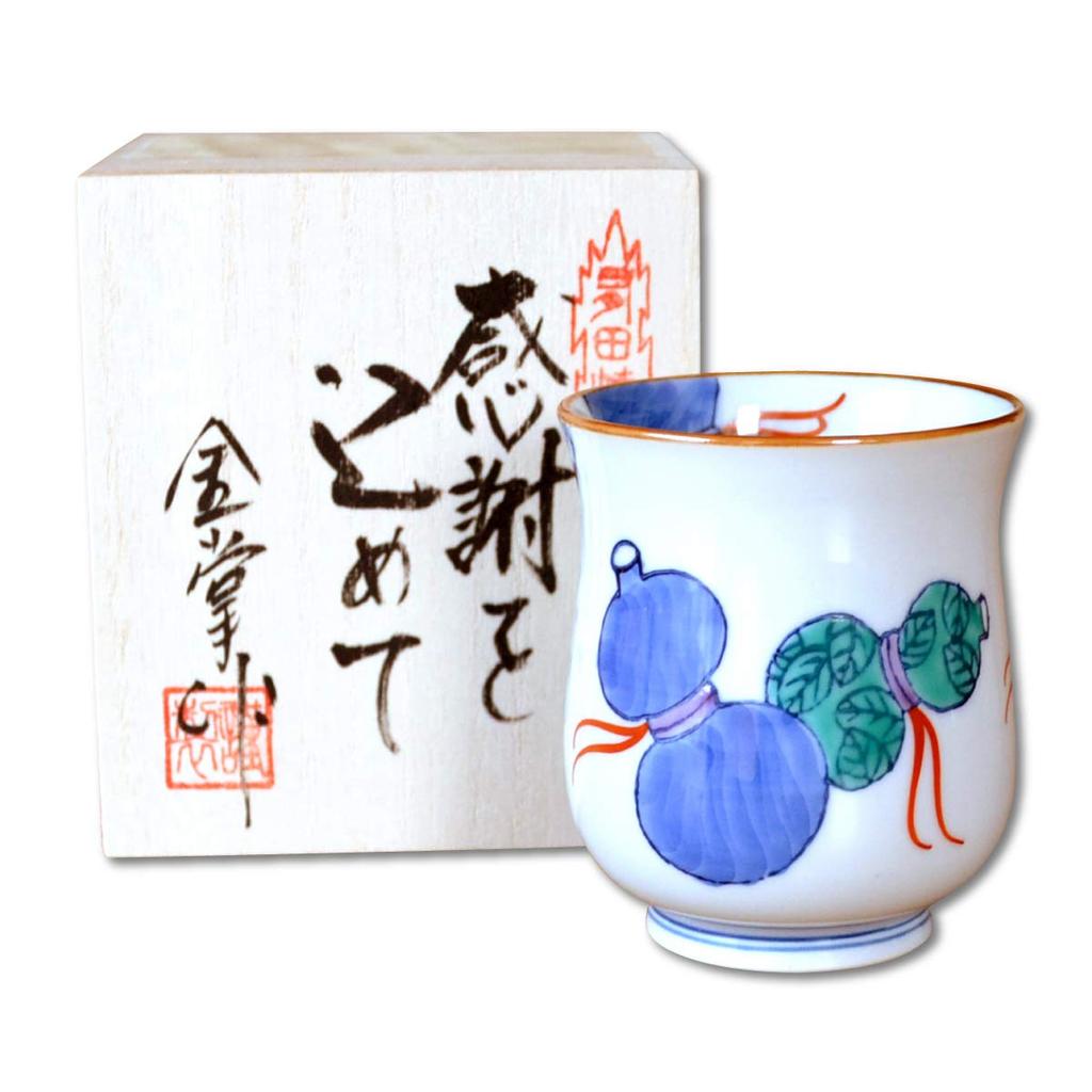 Auspicious gift for men celebrating wishing them good health and Arita ware Nabeshima Rokugyo presented in a wooden box with retirement, prosperity.