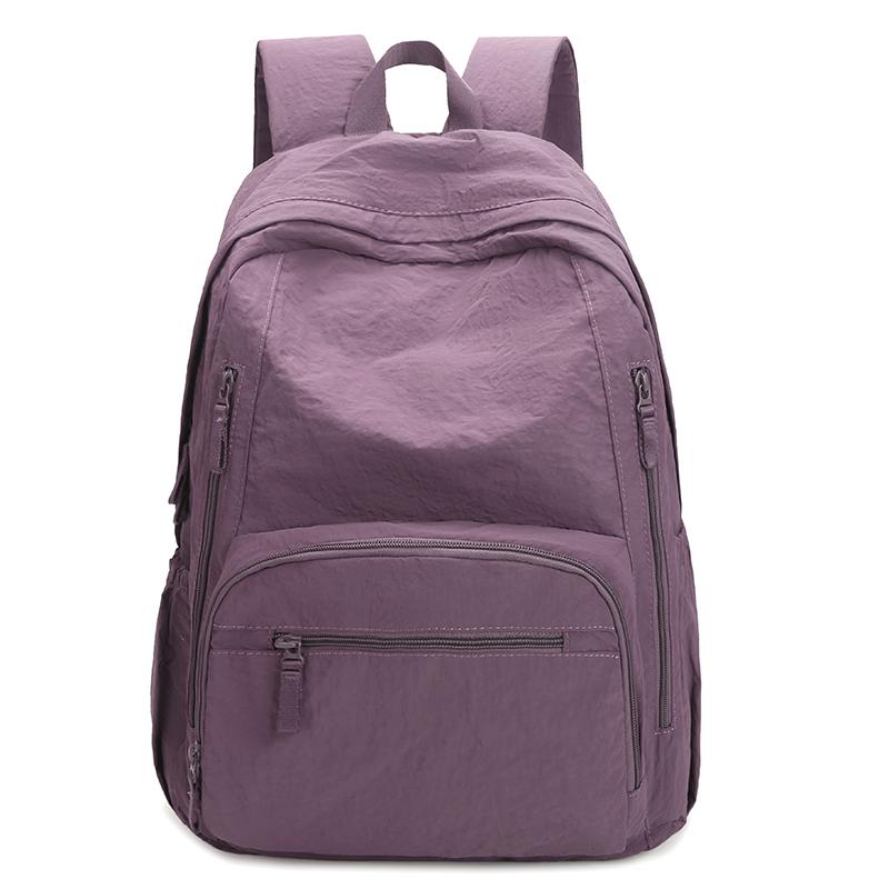 Ryggsäck i enfärgat dam lätt utomhusryggsäck stor kapacitet student skolväska