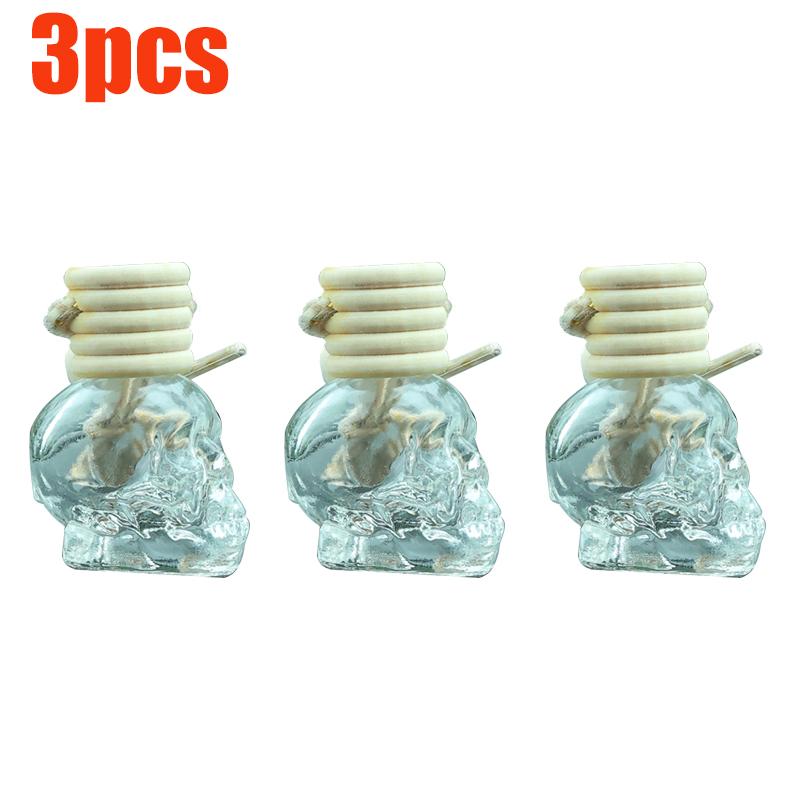 Auto-Lufterfrischer-Diffusor, Aromatherapie-Flasche mit ätherischen Ölen, zum Aufhängen, transparente Totenkopf-Parfümflasche, reinigendes Autozubehör