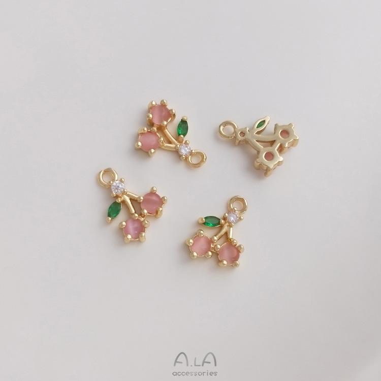 

Подвеска-шарм из золота 14 карат с фианитами в виде фруктов - Вишня, Ананас, Виноград, Манго