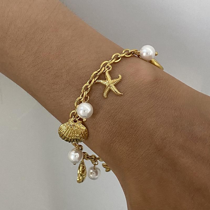 

Zora 18K Gold PVD Plated Stainless Steel Pearl Shell Starfish Charm Bracelet Bangle Women Waterproof Beach Jewelrry Gift JDBW2410001