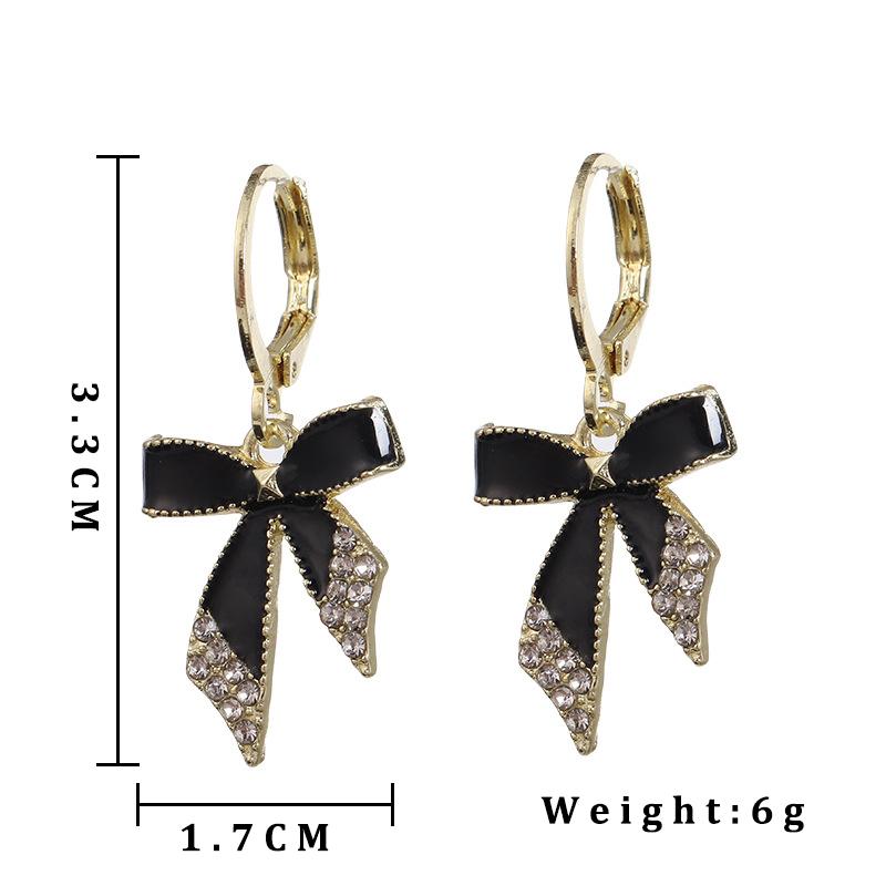 Μαύρα Σμαλτωμένα Κρυστάλλινα Κρεμαστά Σκουλαρίκια Φιόγκος με Λάδι για Γυναίκες Νέα Μοντέρνα Στρογγυλά Σκουλαρίκια Κρίκοι Γάμου Πάρτι Κομψά Χρυσού Χρώματος Κοσμήματα