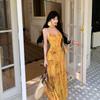 French seaside vacation atmosphere yellow smudged floral V-neck dress women's suspender photo dress summer