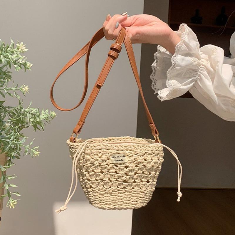 Niche woven bag women's summer new leisure vacation style straw woven bag beach bag mini portable shoulder messenger bag