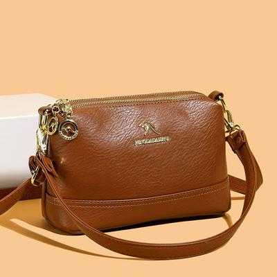 Sac bandoulière classique en cuir avec fermeture éclair et design élégant pour un usage quotidien
