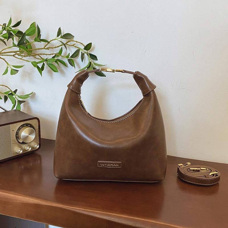 High-end Niche Bag Women's Versatile New Retro Fashion Messenger Bag Women's Portable Dumpling Bag