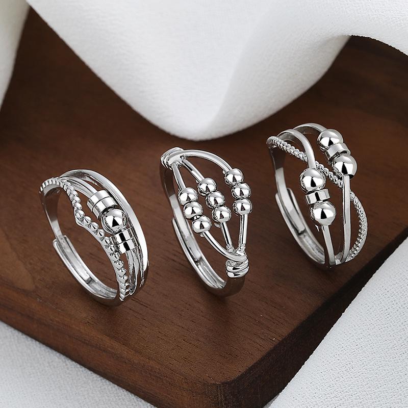 

Carlisle Retro Three-Layer Rotating Bead Ring Adjustable