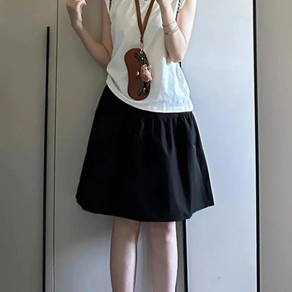 WTEMPO Womens Elastic High Waist Tiered Mini Skirt with Shorts Underneath Cute Boho Pleated Ruffle Skirt with Pockets