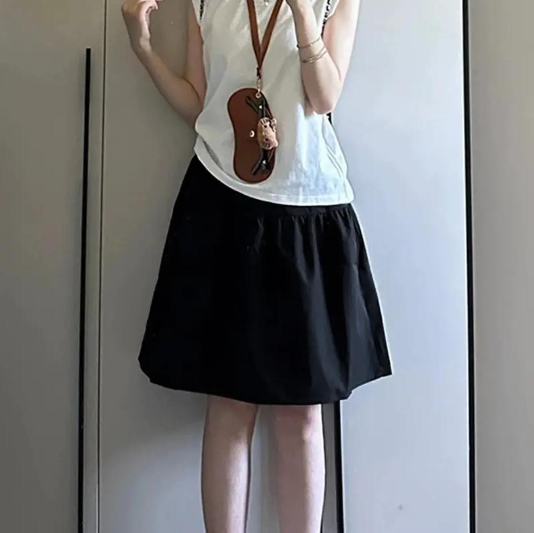 

WTEMPO Womens Elastic High Waist Tiered Mini Skirt with Shorts Underneath Cute Boho Pleated Ruffle Skirt with Pockets XL