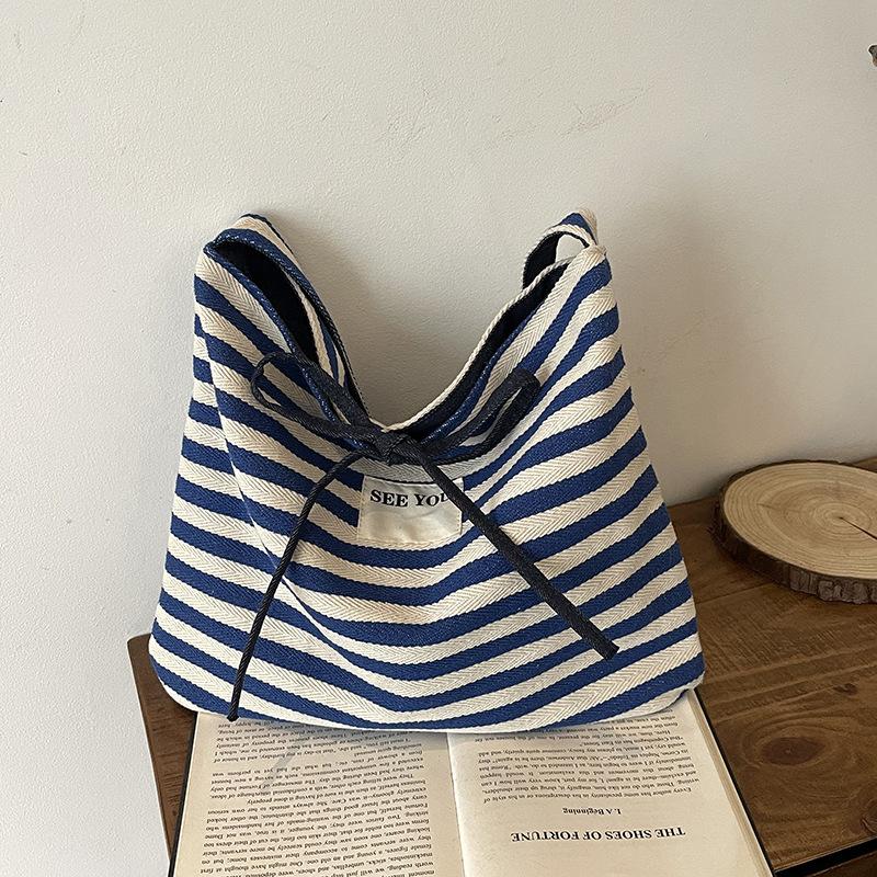 Casual large-capacity striped bag women's new summer commuter versatile messenger bag shoulder tote bag