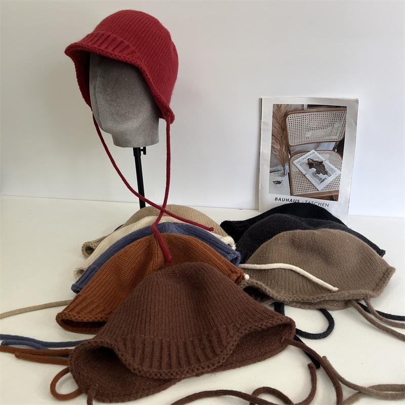 

Autumn and winter warm wool hat women s ear protectors knitted pullover hat straps fashionable and cute pullover hat can be curled M（56-58cm） темно-синього кольору