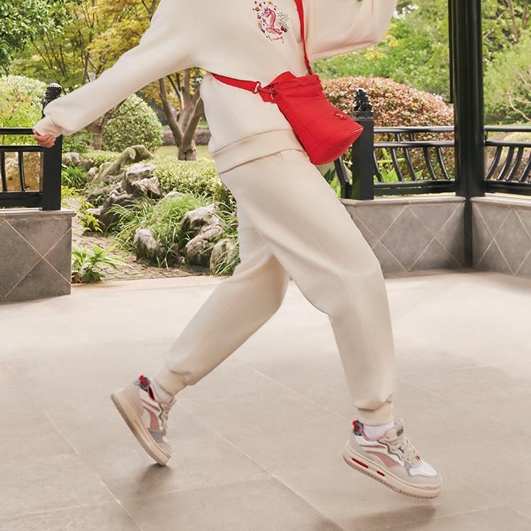 Li Ning Daily Prosperity Series Solid Color Cuffed Casual Knitted Sports Pants Women Pants Off-White AKLU028-4