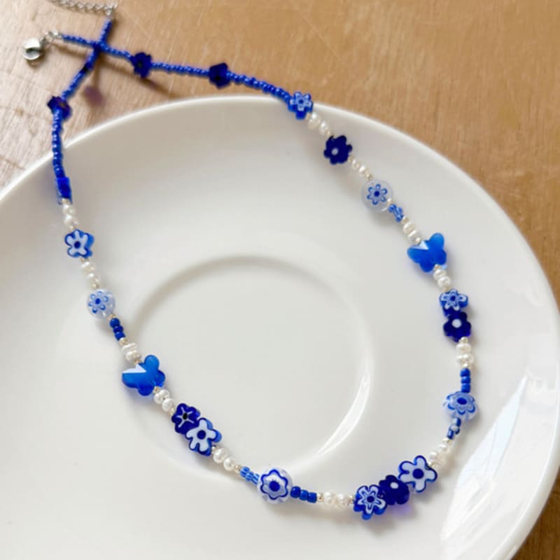 FANTASTIC PLANET Blue Flower Pearl Necklace