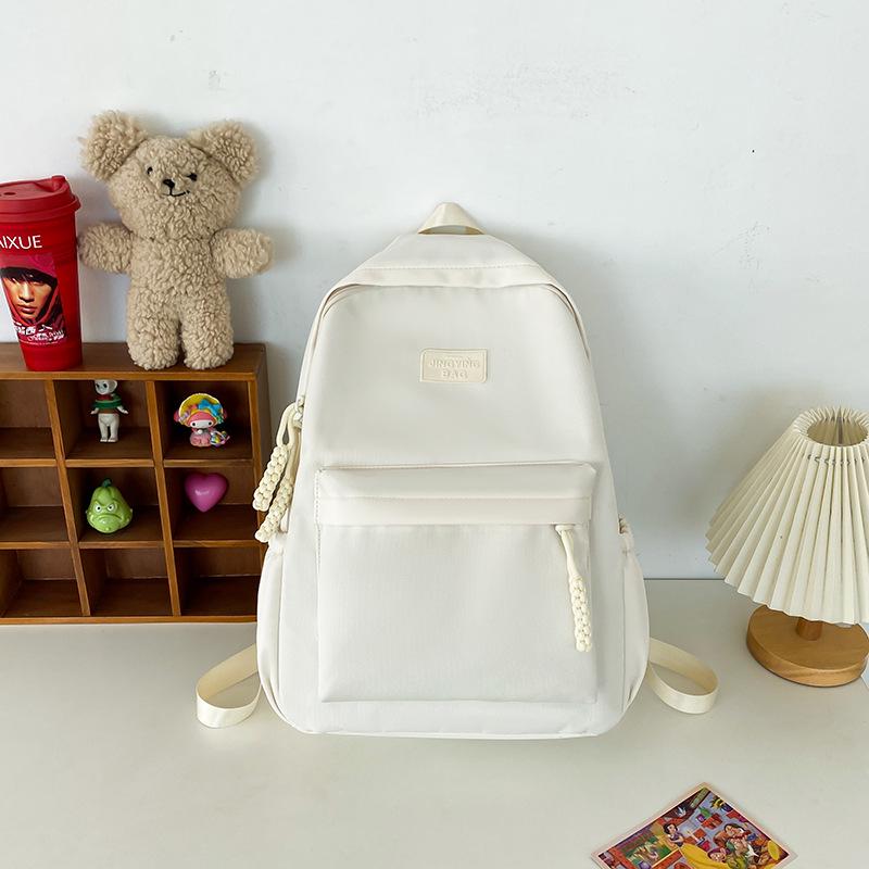 

Durable Solid Color Backpack for Primary and Junior High Students - Niche, Casual, Large Capacity Schoolbag белый