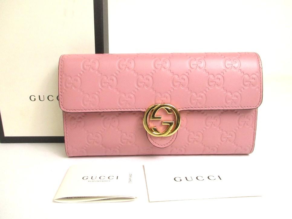 

Оригінальний гаманець-клатч GUCCI GG Guccissima з рожевої шкіри із золотою фурнітурою #a692 Відновлений