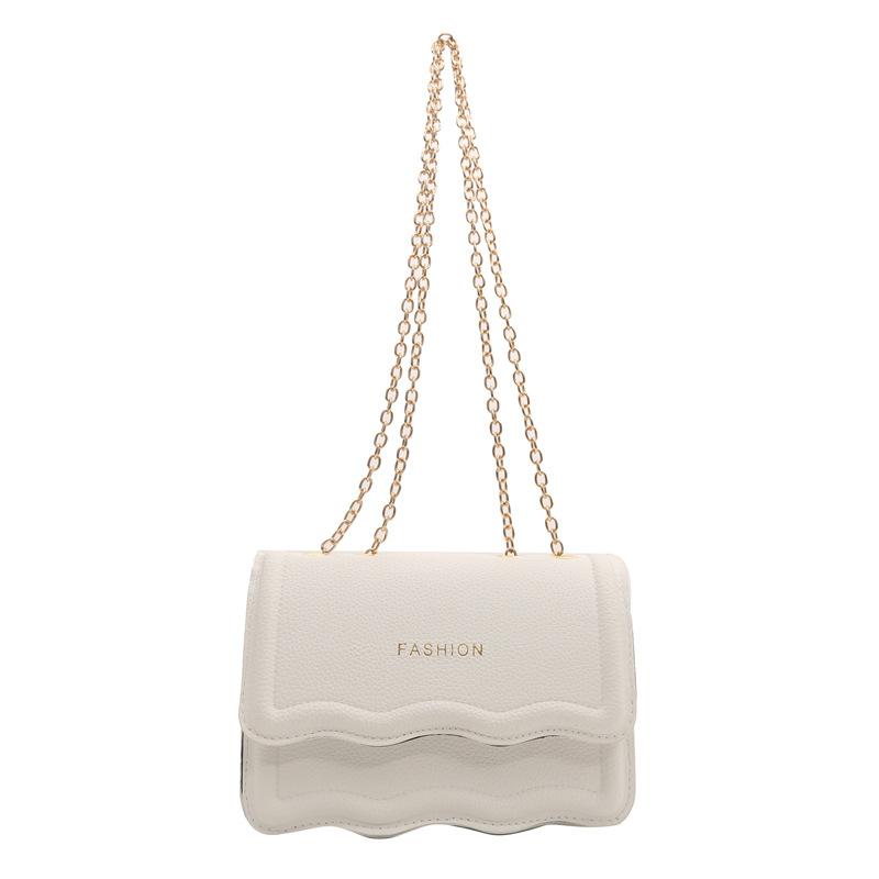 

Textured underarm bag women s 2024 new niche design wave chain shoulder bag simple texture messenger bag білий