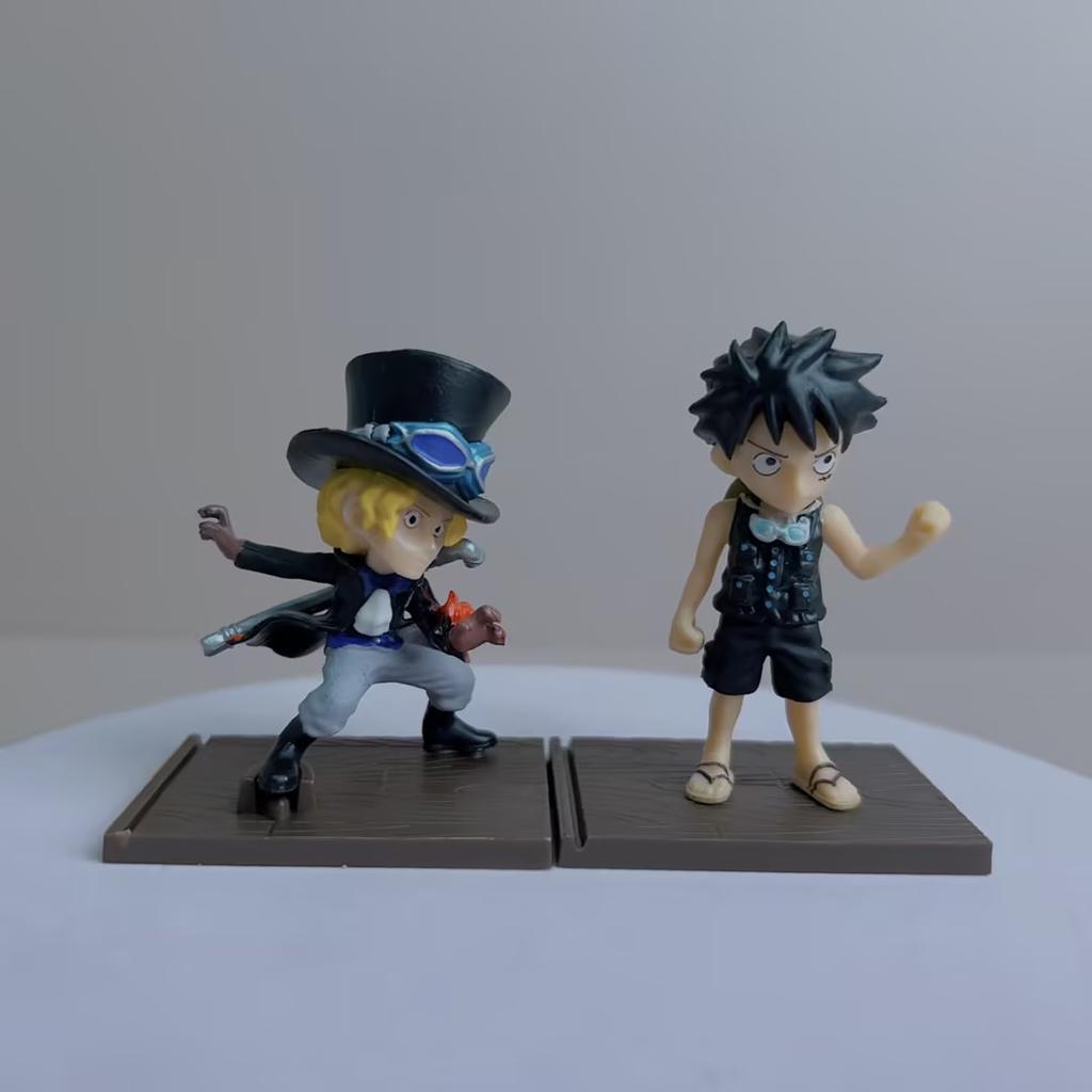7Pcs Anime One Piece Figure Luffy Zoro Sabo Sanji Dracule Mihawk Ace Trafalgar D. Water Law Set Model Toy Gift Collection