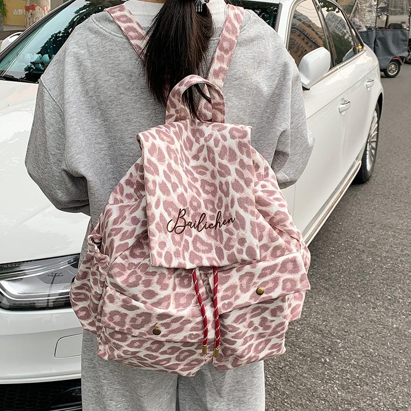 Sac à dos1011 nouveau sac à dos en toile imprimé léopard grande capacité sac de ville pour femme style décontracté sac à dos décontracté sens de la mode