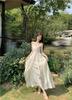Holiday style flower design suspender dress women's 2026 summer new waist thin very fairy long skirt