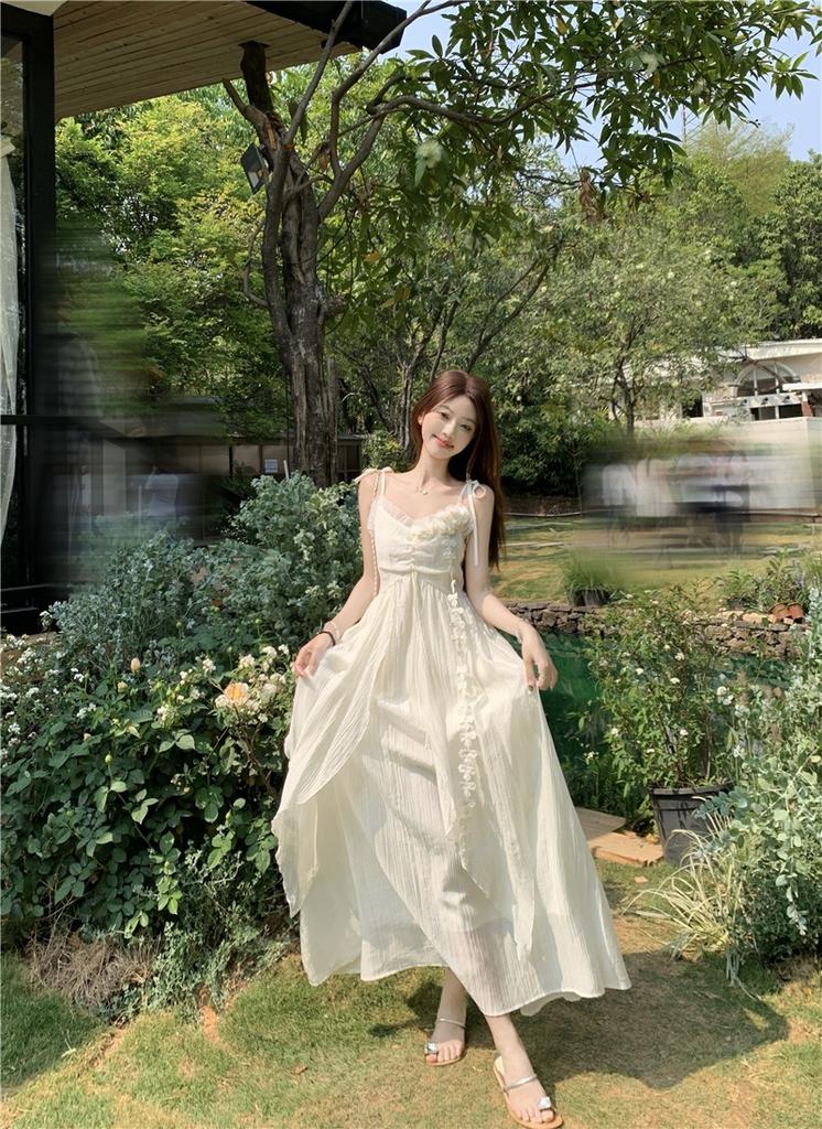 Holiday style flower design suspender dress women's 2026 summer new waist thin very fairy long skirt