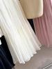 Women's Solid Color Pleated Mesh Half Skirt with Elastic Waist and Patchwork Design for Spring/Summer 2026