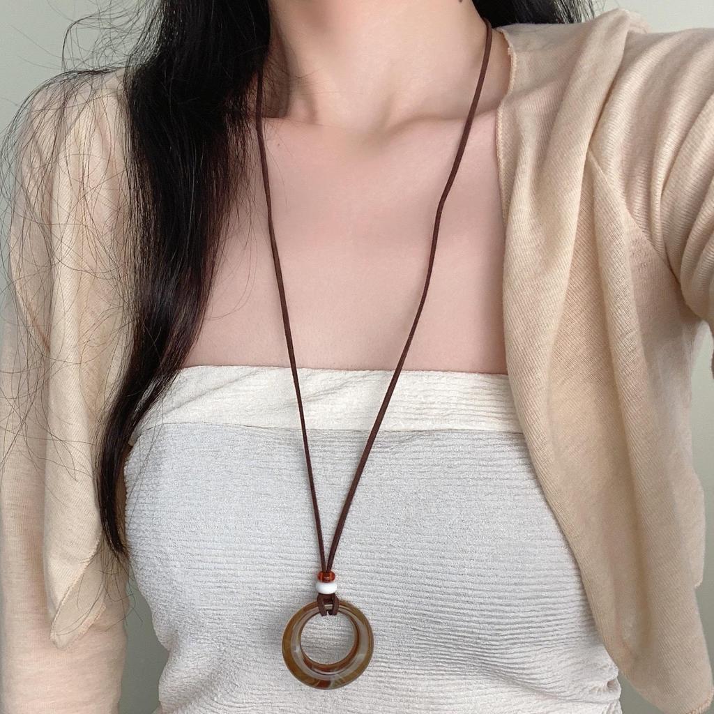 "Ethnic-Style Black Rope Ring Pendant Necklace - New Chinese Design for Autumn & Winter"
