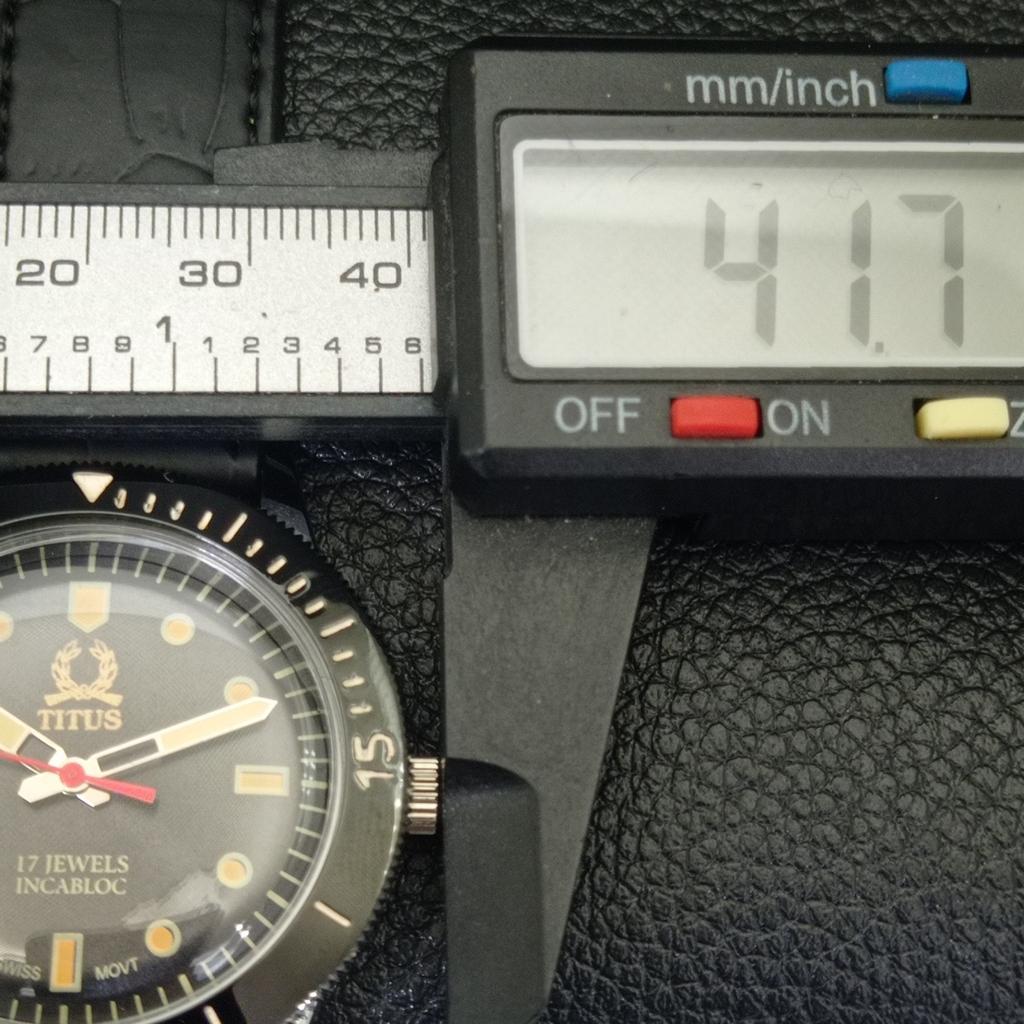 Käsitsi üleskeeratav VINTAGE TITUS SWISS MEESTE PÖÖRATAVA BEZELIGA MUSTA NUMBRILAUAGA KELL a700244-5 R202-a700244