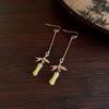 "Silver Needle Bamboo Fan Earrings: Butterfly Drop, Retro Fashion for Women"