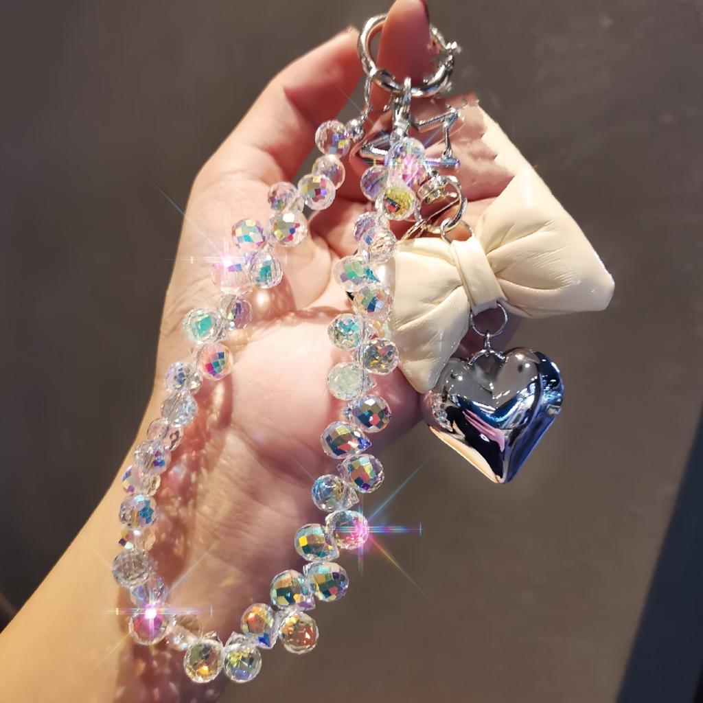 Ins style beaded phone wrist chain, love tie design, universal anti-lost short pendant lanyard for women outdoor shopping travel.