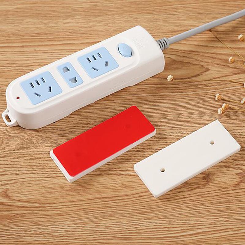 Magic Plug Holder Strips Seamless No Punch Plug Sticker Wall Fixer For Sockets Magic Plug Holder Strips Seamless No Punch Plug Sticker Wall Fixer For Sockets