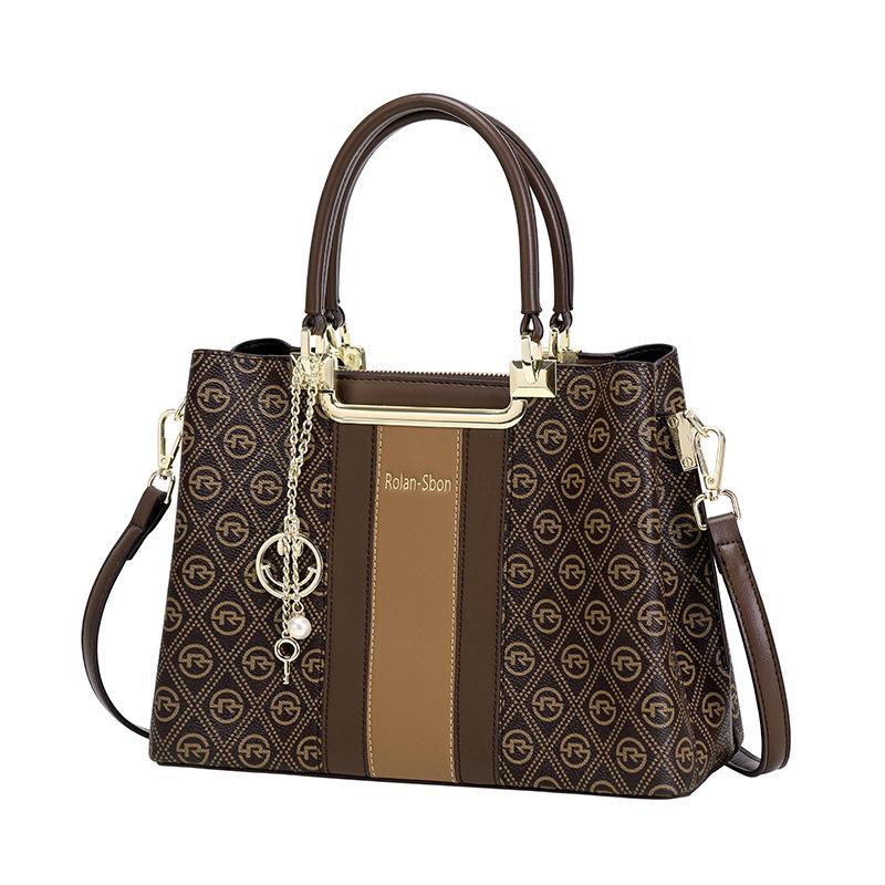 Atmosphärische und großvolumige Damen-Tragetasche Frühling High-End Nische Retro-Druck Einfache Handtasche mit einer Schulter Crossbody