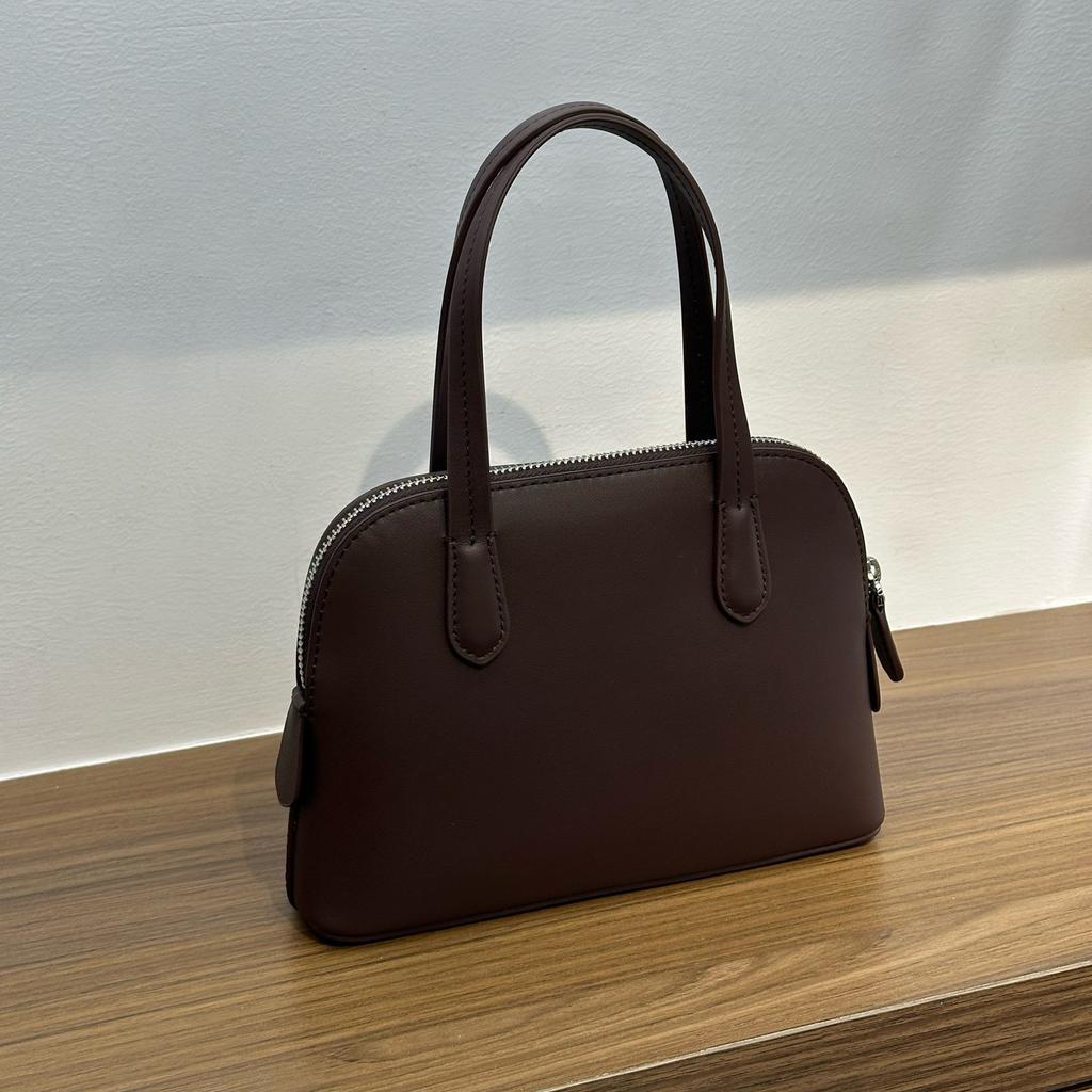 Niche first-layer cowhide minimalist 2026 new spring and summer shell bag single shoulder crossbody portable commuter bowling bag