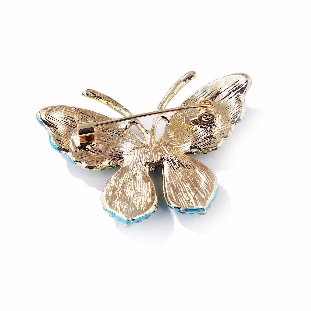 Kreativní drahokamová brož s motýlem Dámský temperament Módní kabát Střízlivé a módní oděvní doplňky Špendlík Korsáž Brož Šperky