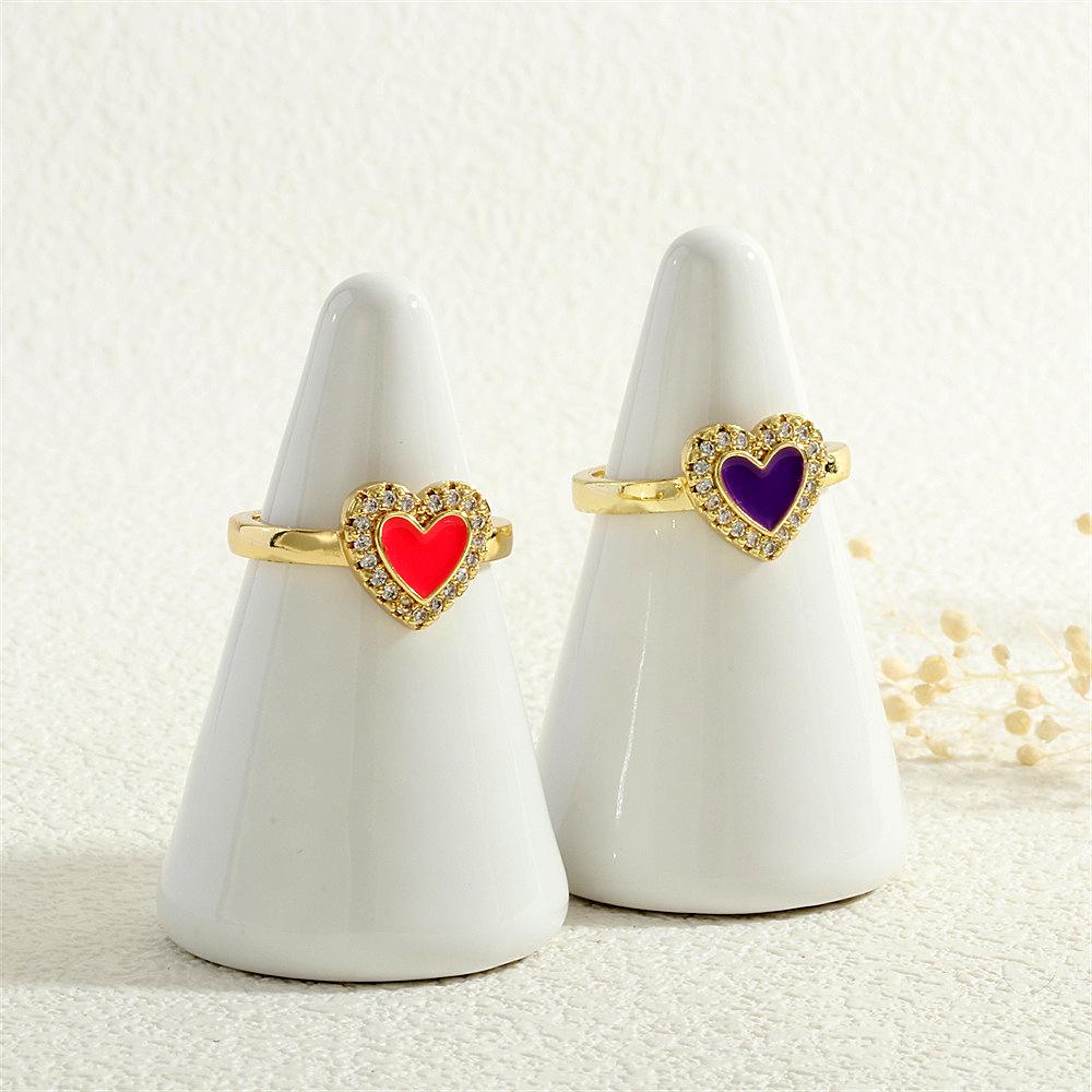 High-End Damenringe aus Europa und Amerika: 18K Kupfer, Mikropavé Zirkon, Herzförmiges Pfirsichherz, Buntes Tropföl, Verstellbar.