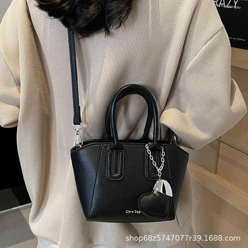 Trendy portable bucket bag 2025 summer new ins simple Auruofeng shoulder bag niche fashion messenger bag
