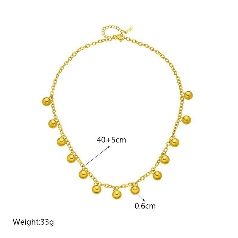Collana con Ciondolo in Acciaio Titanio e Perla Dorata: Catena da clavicola da donna elegante, resistente al colore, di lusso leggero