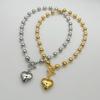 European & American Geometric Heart Choker: Gold Beaded Necklace with Round Peach Heart Pendant for Women