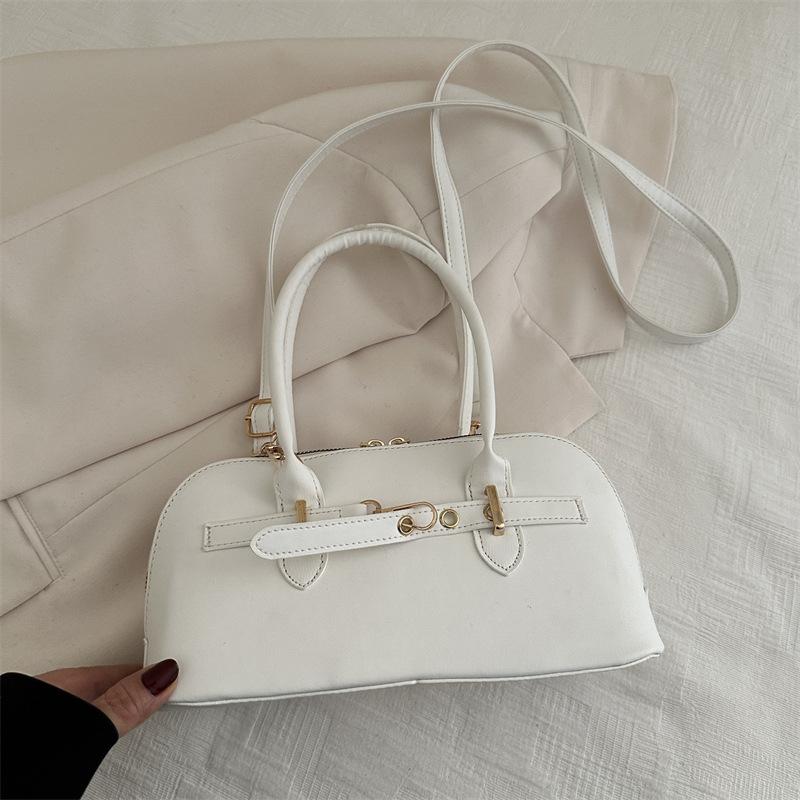 Simple niche portable commuter bag women's new fashionable retro underarm bag simple large-capacity messenger bag