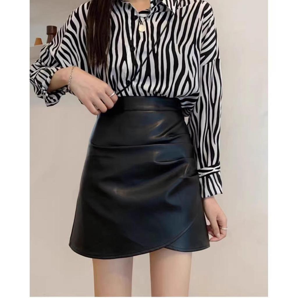 Women's Black Mini Leather Skirt: High-Waisted, Pleated A-Line, Plus Size, Anti-Exposure, Slimming Design for Spring and Autumn.