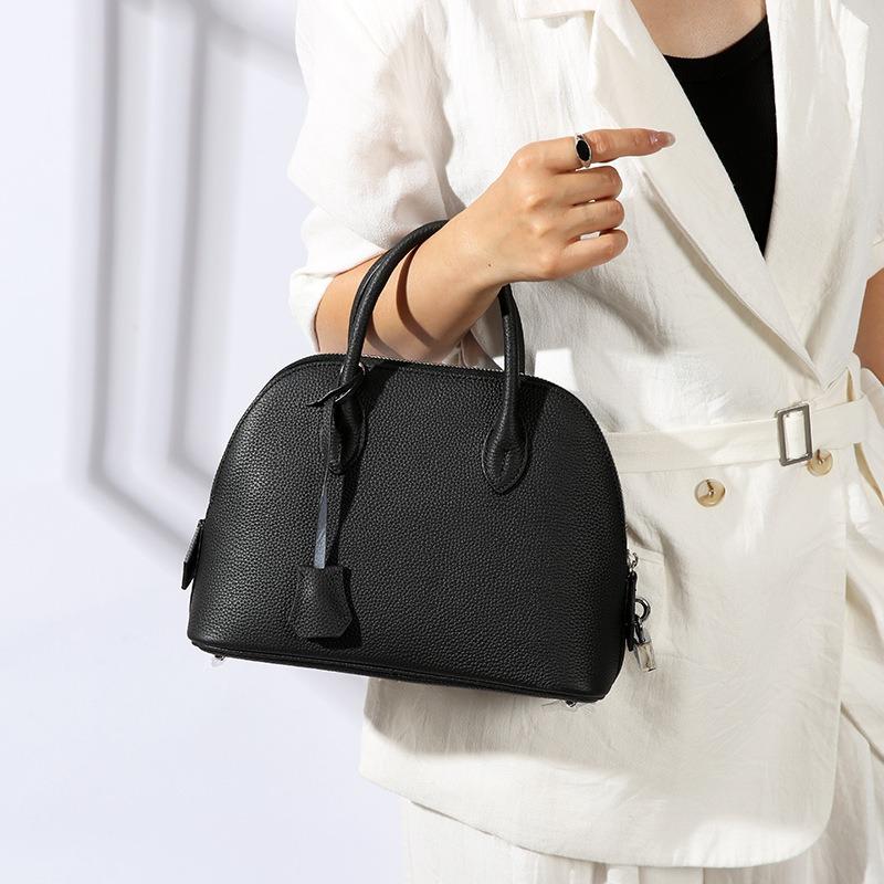 

Легкая роскошь, нишевая, большая вместимость, сумка-боулинг, высококачественная натуральная кожа, кроссбоди, женская сумка, сумка-ракушка One Size чёрный