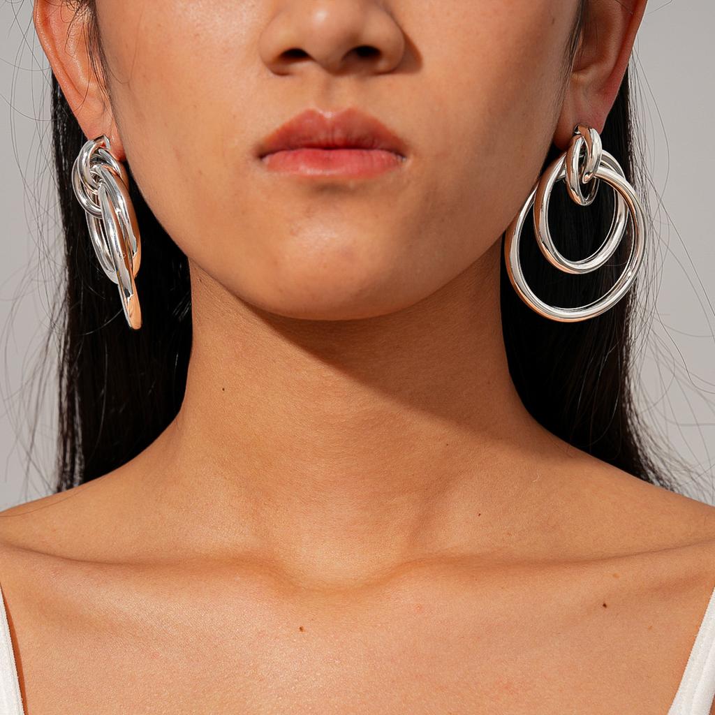 Geometric round winding hollow steel needle earrings environmentally friendly niche earrings