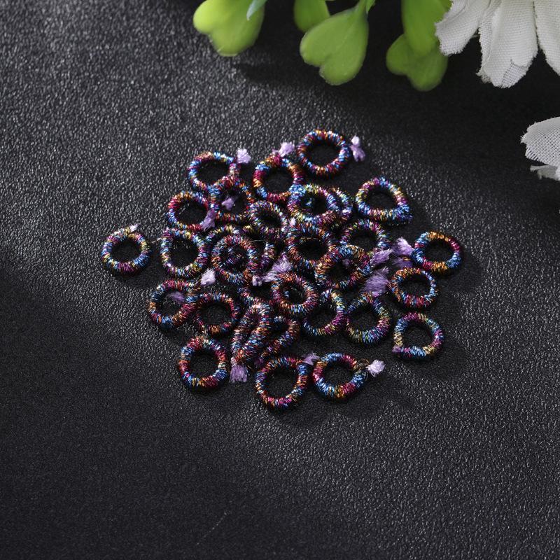 Exquisite Gold Ring with Wire Coil, Gold & Silver Buckle, and Woven Knot Ball