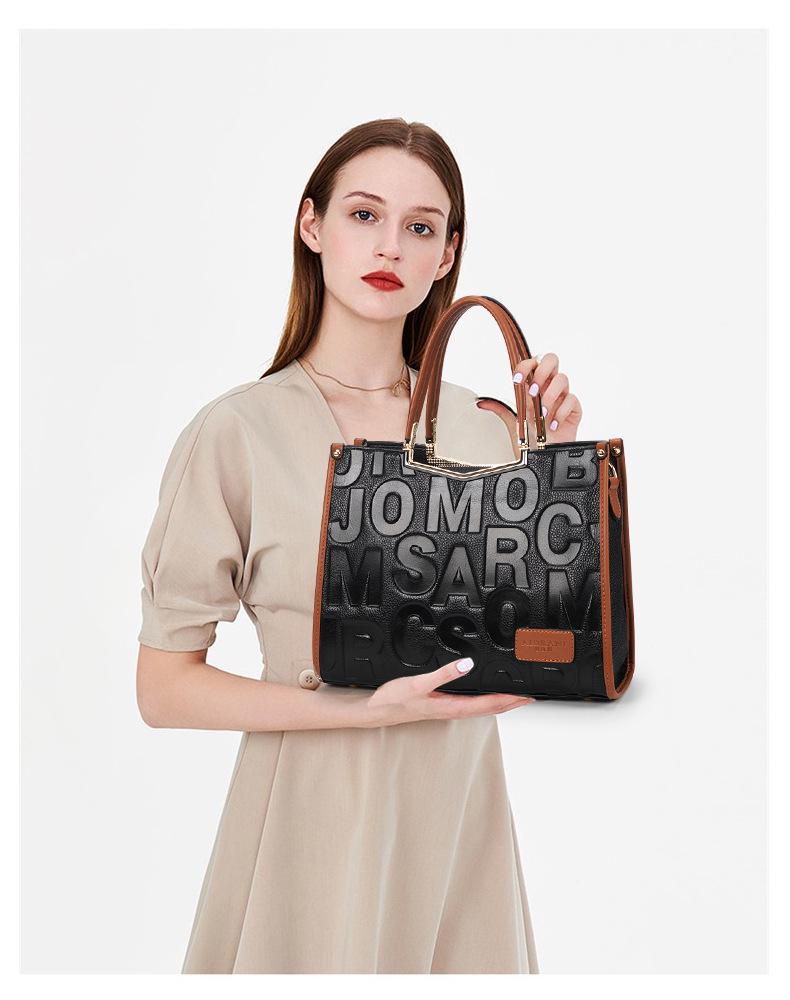 Qian Dian 2025 Snygg Mångsidig Handväska för Kvinnor - Stor Kapacitet Äkta Läder Damväska