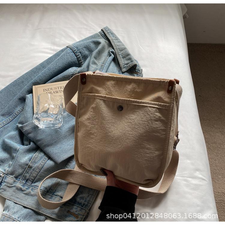 Korean version of casual canvas bag new solid color simple fashion trend shoulder bag niche design messenger bag mobile phone bag
